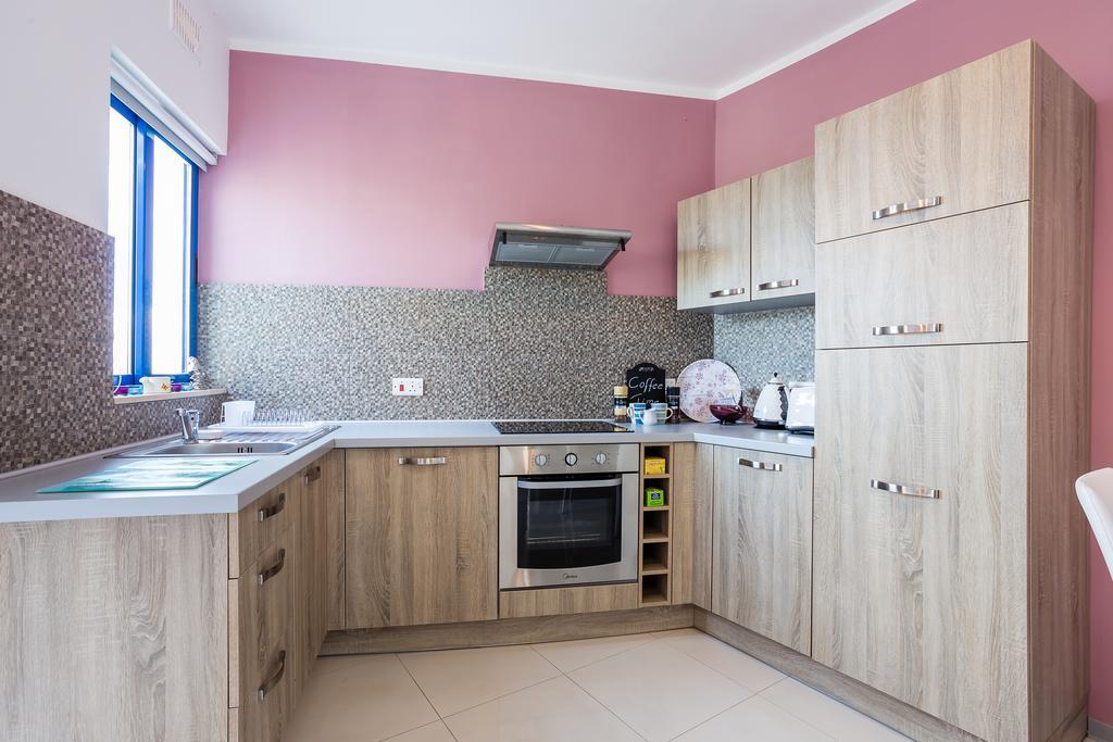 Appartement Seaview Luxury Penthouse With Shared Swimming Pool à Għajnsielem Extérieur photo